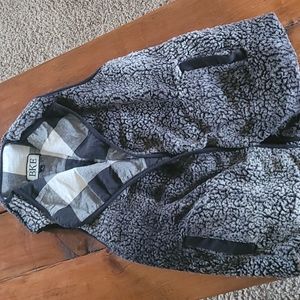 Bke shepard vest with black and white plaid lining
